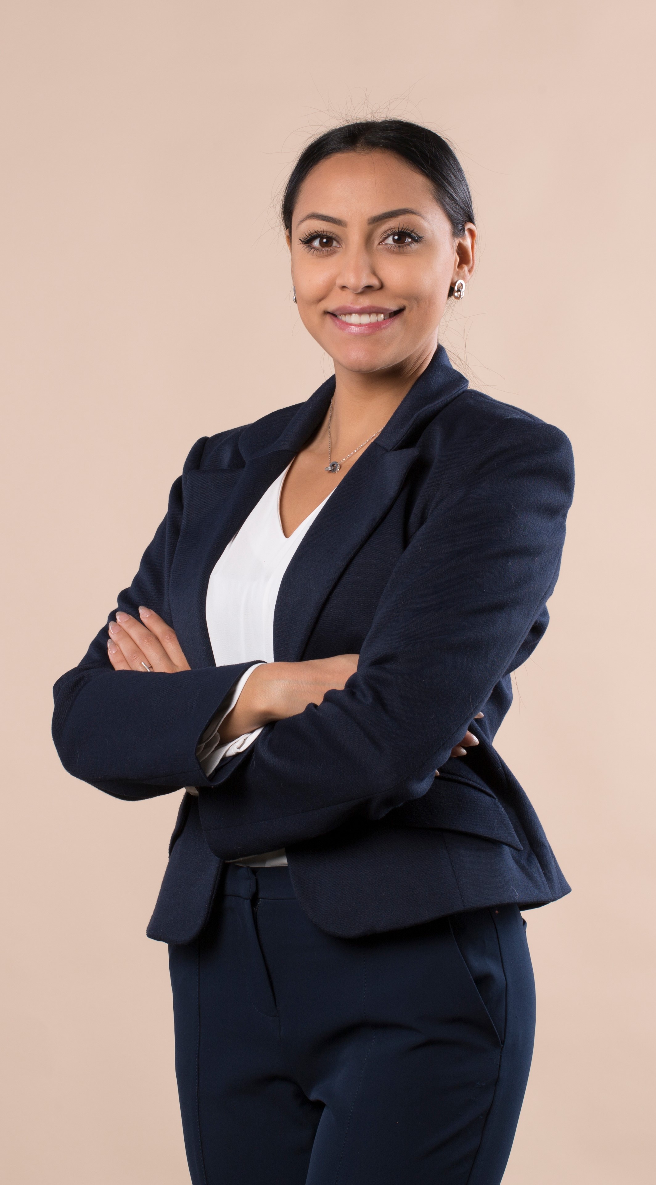 Smiling Woman in a Navy Blue Suit